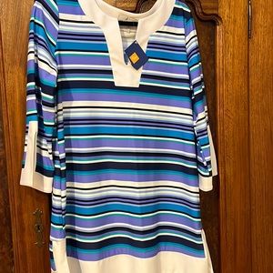 Jude Connelly slightly full dress. Purple black turquoise light blue stripe.